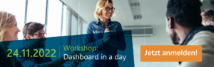 Personen in einem Besprechungsraum wÃ¤hrend eines Workshops AnkÃ¼ndigung mit Text: â€ž24.11.2022 Workshop: Dashboard in einem Tagâ€ und einem orangefarbenen Button mit der Aufschrift â€žJetzt anmelden!â€