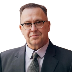 Professionelles Business-PortrÃ¤t einer Person in Anzug und Krawatte vor einem schlichten weiÃŸen Hintergrund, das unternehmerische ProfessionalitÃ¤t, FÃ¼hrungsstÃ¤rke und eine gepflegte Ausstrahlung als FÃ¼hrungskraft vermittelt.